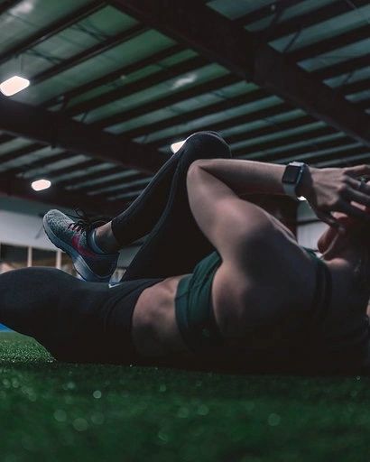 A person working out on the gym floor